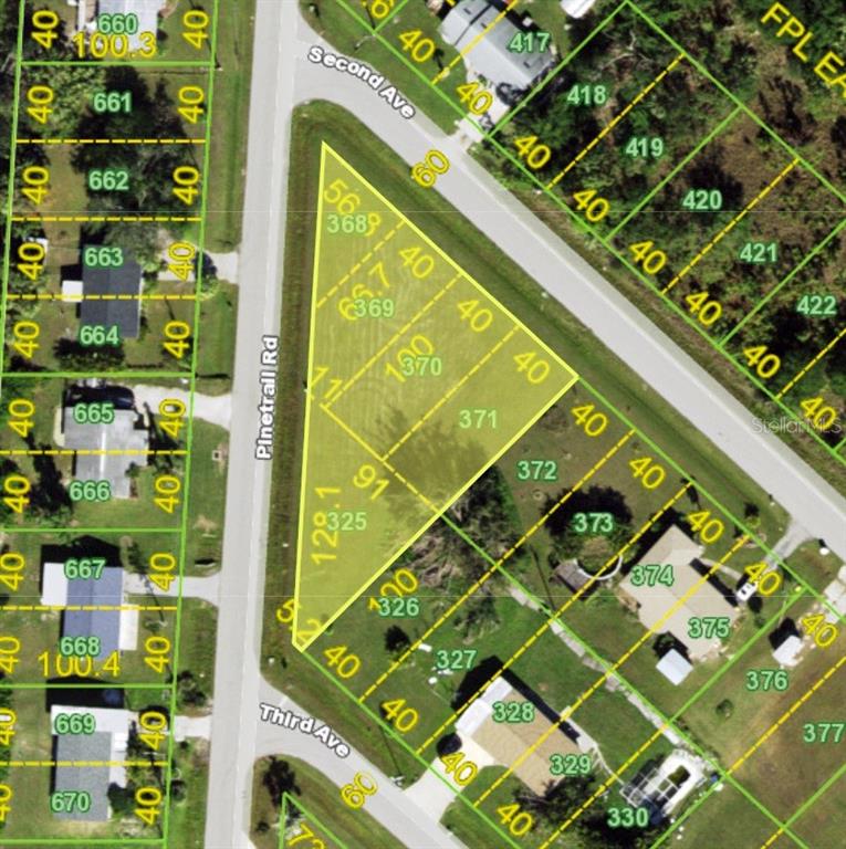 This is a map showing a triangular vacant lot bordered by roads and residential properties — 11131 2ND AVENUE, PUNTA GORDA, FL