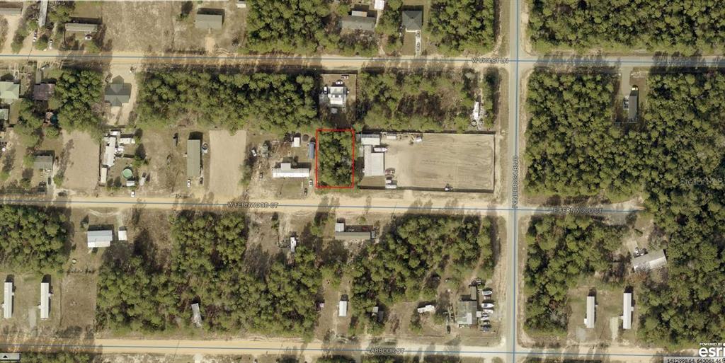 This is an aerial map showing a rectangular plot of land outlined in red — E FERNWOOD COURT, DEFUNIAK SPRINGS, FL