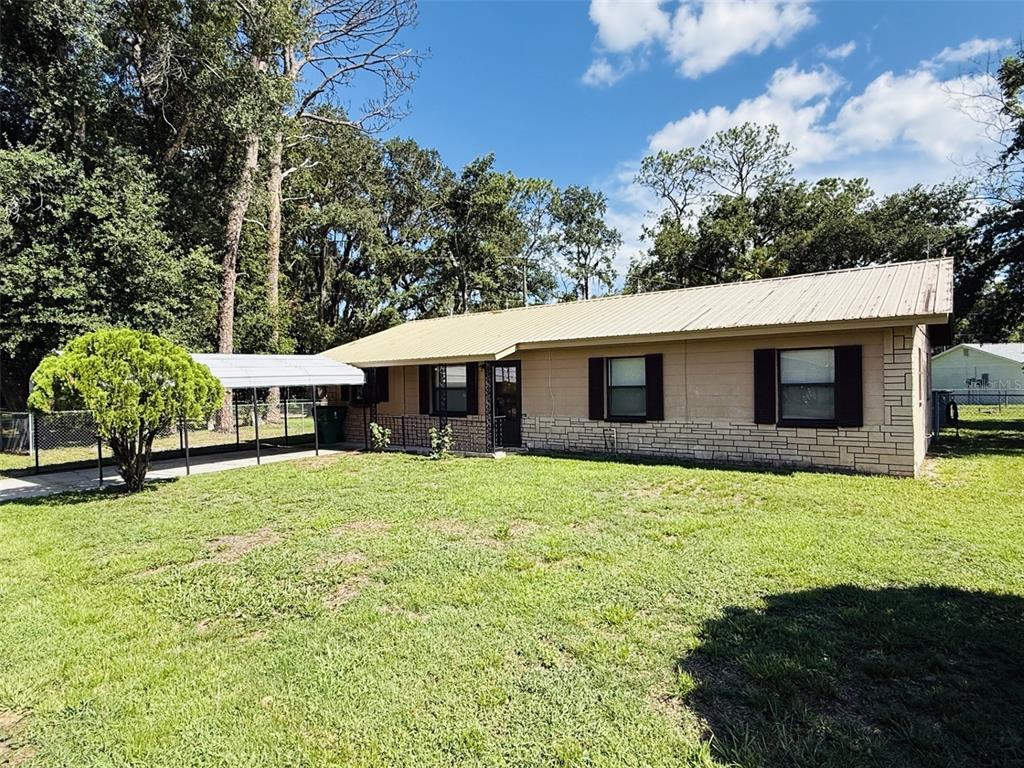 39048 BLUE JAY AVENUE, ZEPHYRHILLS, FL — photo 2 of 30