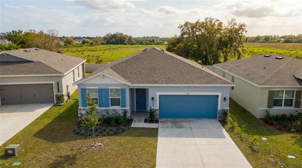693 CROWN ROSE DRIVE, EAGLE LAKE, FL — photo 4 of 28