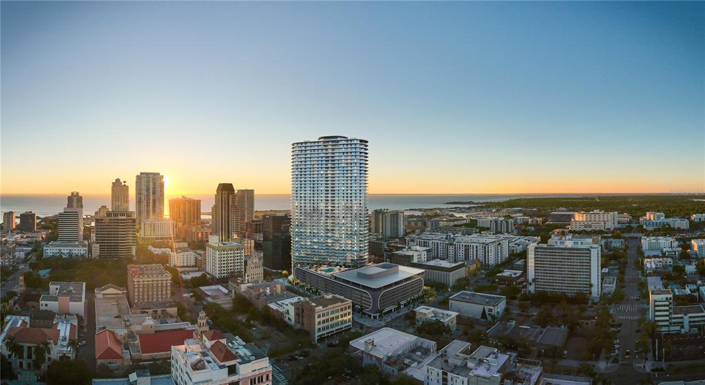 This is a rendering of a high-rise apartment building in a city at sunset — 400 CENTRAL AVENUE UNIT 2207, ST PETERSBURG, FL