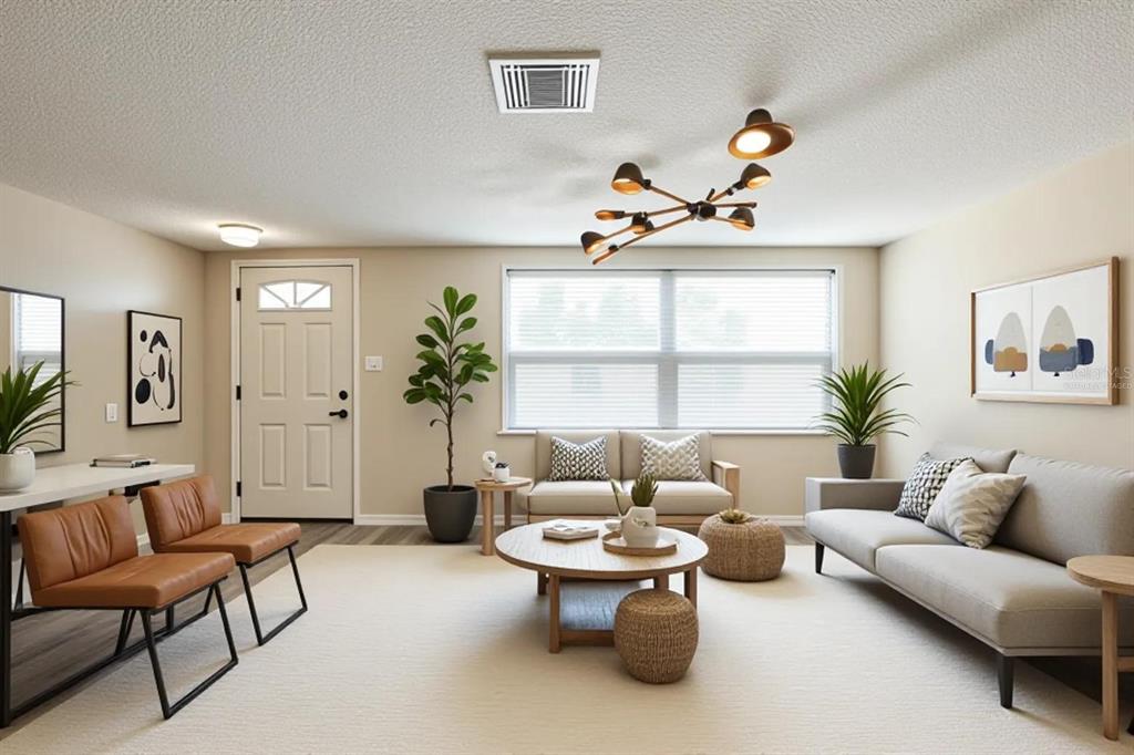 A living room features a light-colored sofa, two leather chairs, a coffee table, and lighting — 9811 RAINBOW LANE, PORT RICHEY, FL