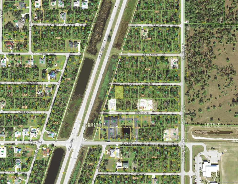This is a satellite map showing residential lots and streets in a suburban area — 23467 MOSES COURT, PORT CHARLOTTE, FL