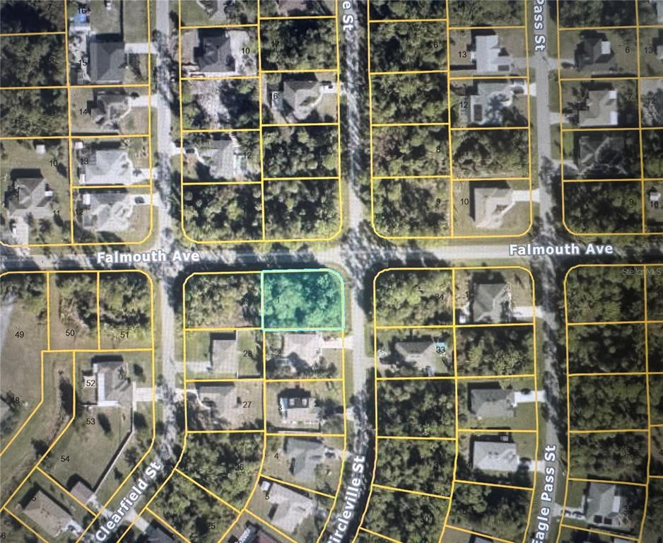 This is an aerial map showing a vacant residential lot highlighted in light blue — CIRCLEVILLE STREET, NORTH PORT, FL