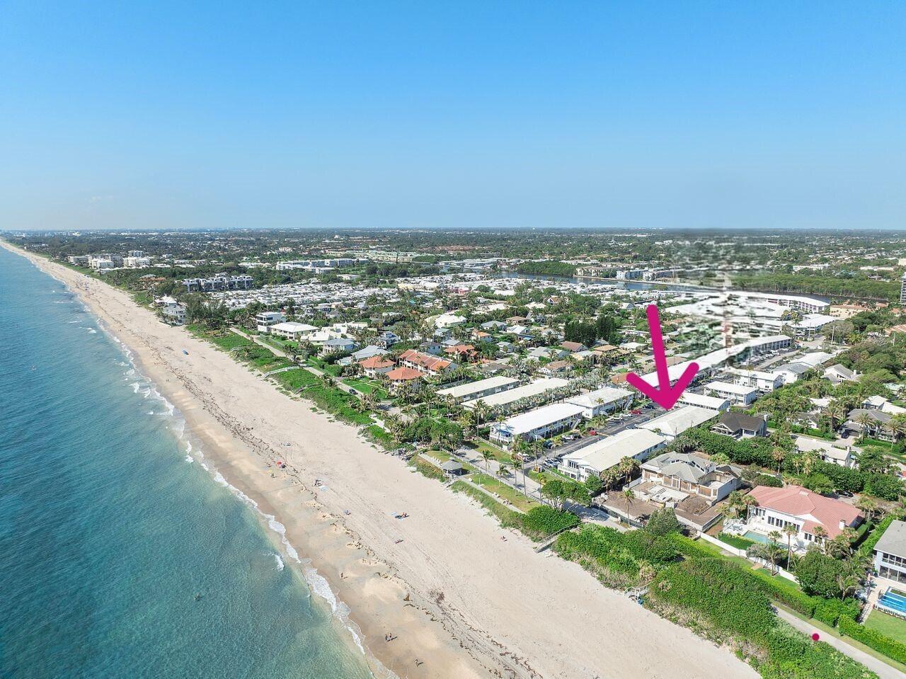 An aerial view of a coastal neighborhood with a pink arrow pointing toward a building — 5505 N Ocean Boulevard # 204, Ocean Ridge FL 33435, OCEAN RIDGE, FL