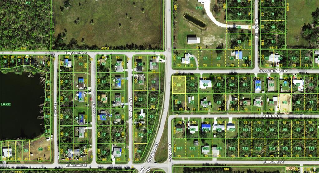 This is an aerial map showing residential lots, streets, and a lake — 2620 COOPER STREET, PUNTA GORDA, FL