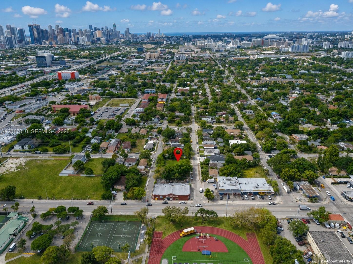 An aerial view shows a red map pin marking a vacant lot in a city — 3509 NW 9th Ave, Miami FL 33127, MIAMI, FL
