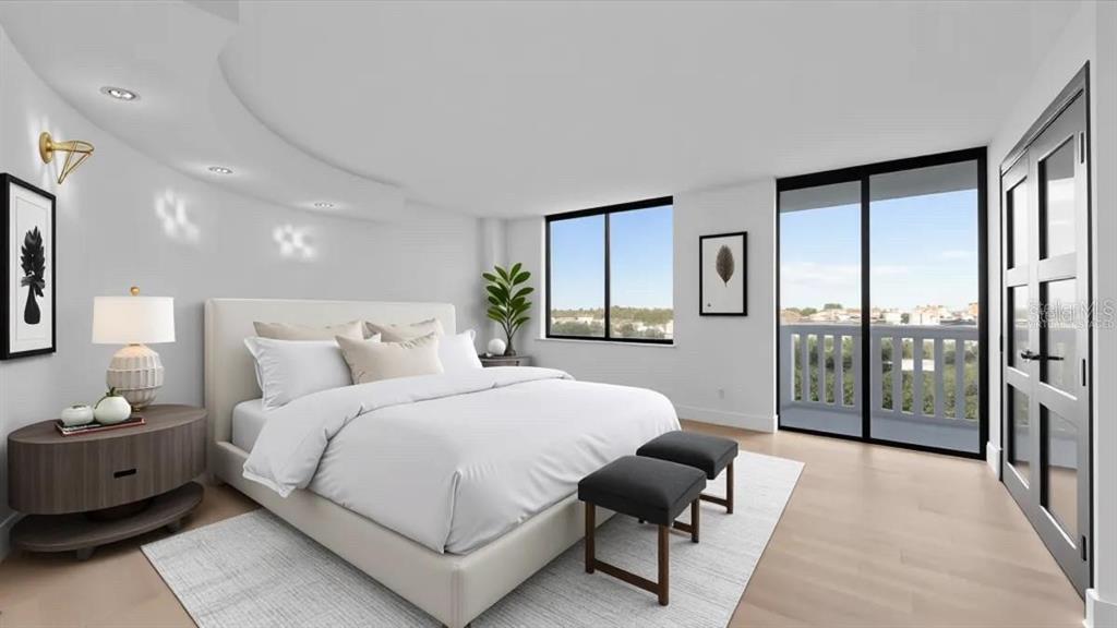 This is a digitally staged bedroom featuring a bed, nightstand, two ottomans, and a balcony — 400 E COLONIAL DRIVE UNIT 1606, ORLANDO, FL