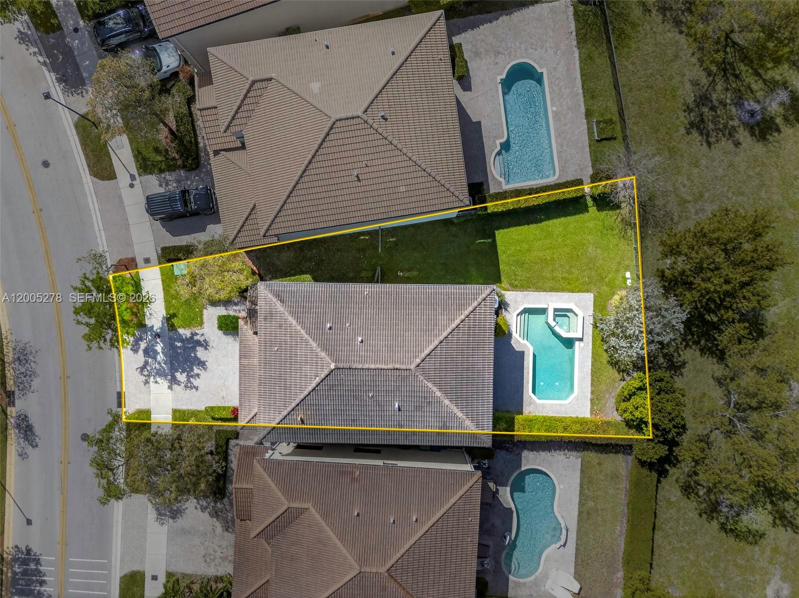 An aerial view shows a residential property with a house, pool, and backyard landscaping — 19278 NE 6th Ave, Miami FL 33179, MIAMI, FL