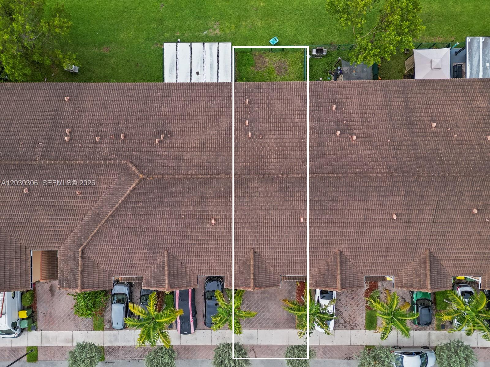 An aerial view shows a townhome unit highlighted by a white rectangle within a complex — 2390 SE 15th St, Homestead FL 33035, HOMESTEAD, FL