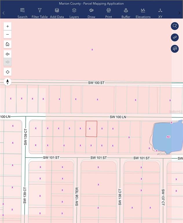 This is a digital parcel map showing property boundaries and street names in Marion County — SW 100TH LANE, DUNNELLON, FL