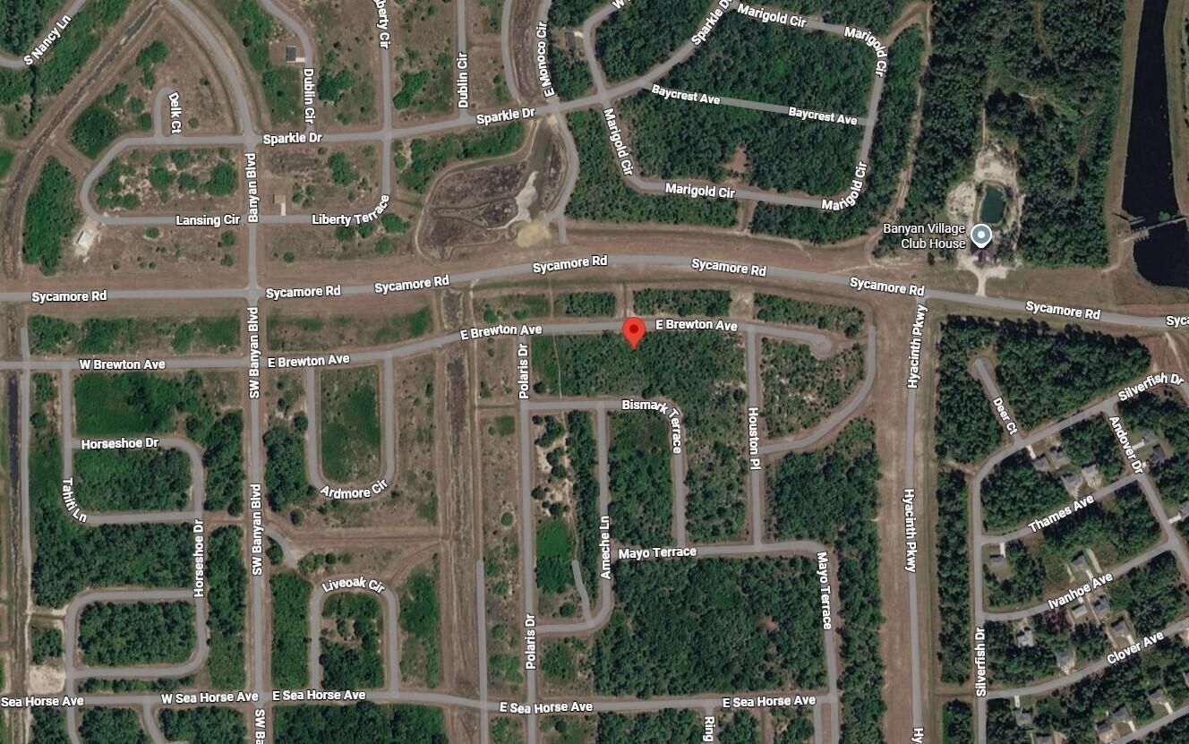 This is a satellite map view of a residential neighborhood with streets and wooded lots — 133 Apollo Avenue, FL 33935, FL