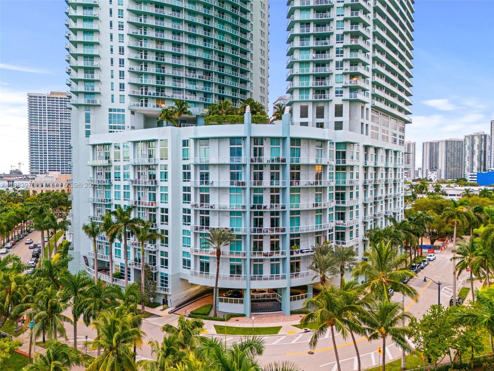 An exterior view of the Quantum on the Bay high-rise condominium building in Miami — 1900 N Bayshore Dr # 4018, Miami FL 33132, MIAMI, FL