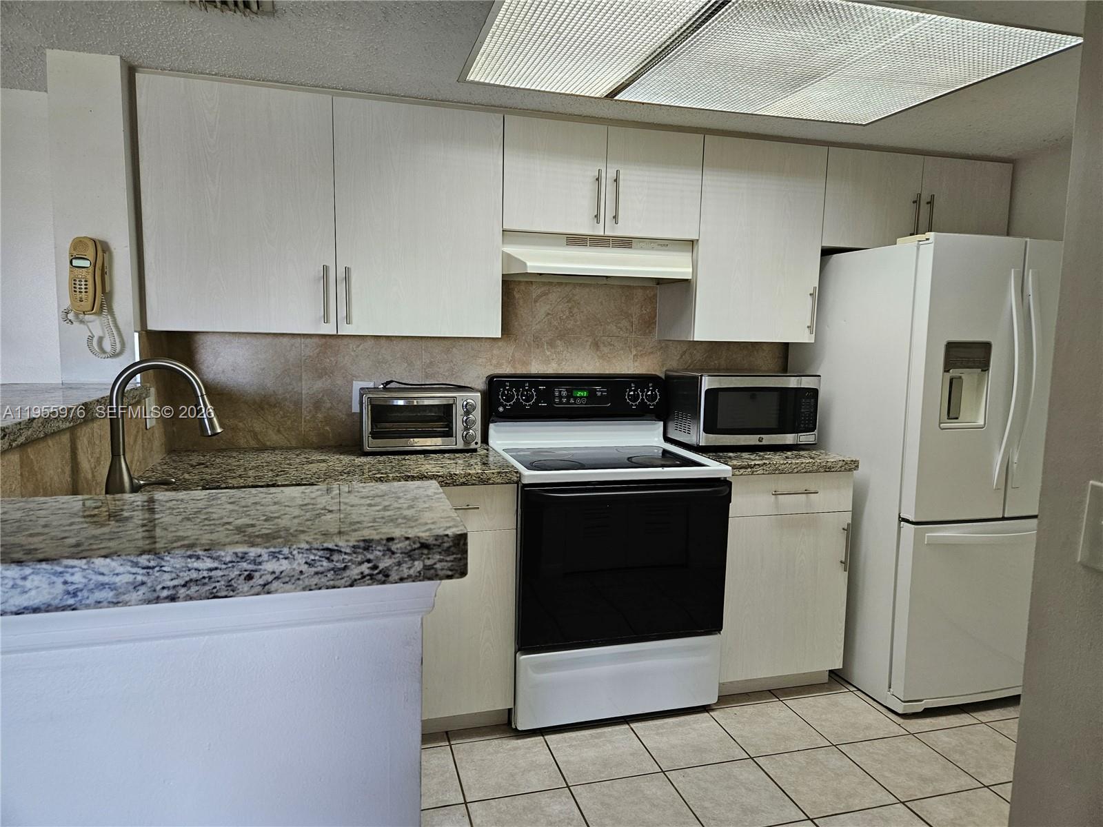 5011 Wiles Rd # 306, Coconut Creek FL 33073