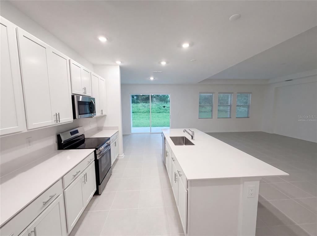 669 TUNDRA LOOP, GROVELAND, FL — photo 2 of 23