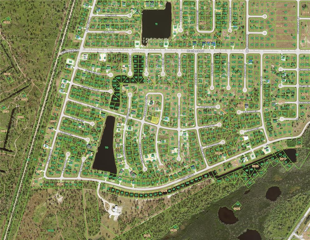 This is an aerial map of a residential neighborhood featuring multiple streets and a lake — 34 MAST DRIVE, PLACIDA, FL