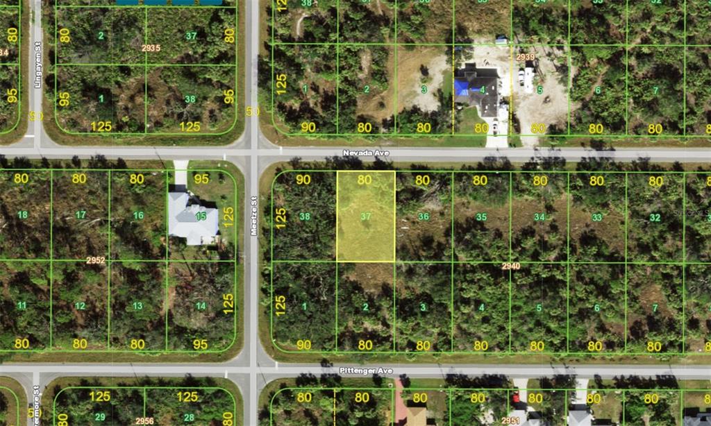 This is an aerial map showing a highlighted vacant lot within a residential subdivision — 14123 NEVADA AVENUE, PORT CHARLOTTE, FL