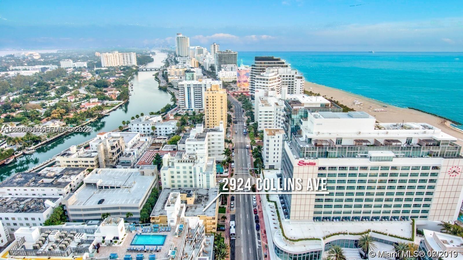 An aerial view shows a coastal city street lined with high-rise hotels and buildings — 2924 Collins Ave # 301, Miami Beach FL 33140, MIAMI BEACH, FL