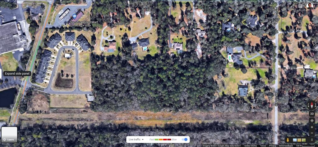 This is a satellite map view of a residential neighborhood with wooded areas and roads — 000 NW 35TH STREET, OCALA, FL