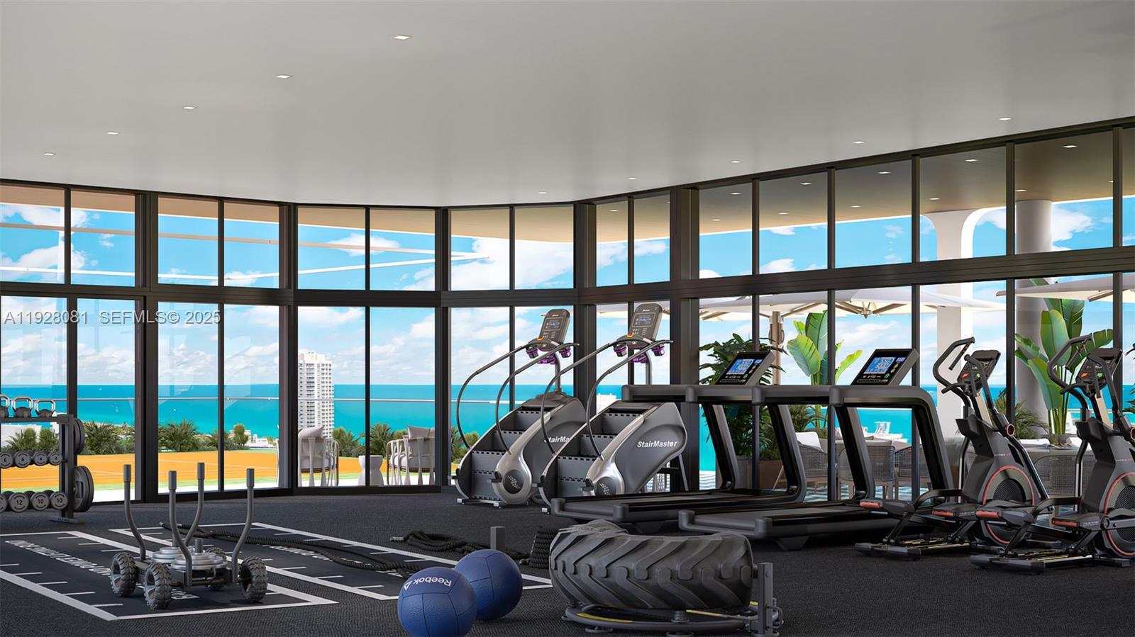 This rendering shows a modern gym with exercise equipment and floor-to-ceiling windows overlooking the ocean — 6940 Abbott Ave # 914, Miami Beach FL 33141, MIAMI BEACH, FL
