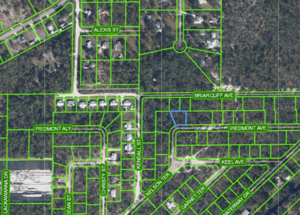 This is an aerial map showing a highlighted parcel of land within a residential neighborhood — 4606 PIEDMONT AVENUE, SEBRING, FL