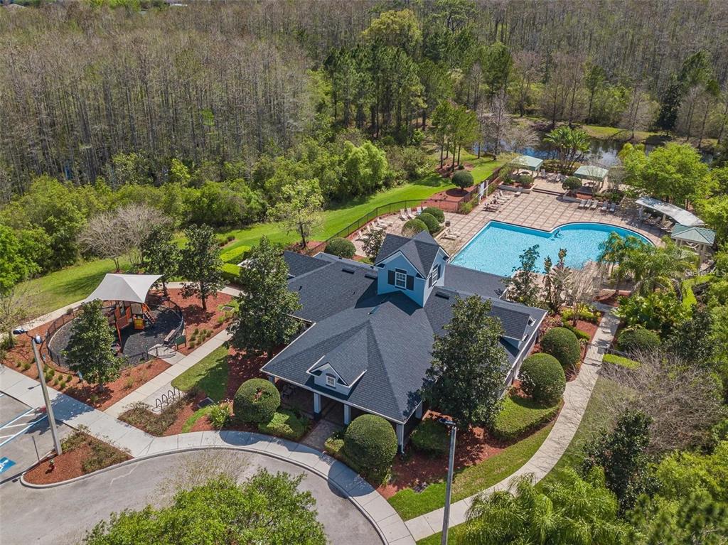 An aerial view of a community clubhouse with a swimming pool and a playground — 1615 CROYDON STREET, ORLANDO, FL