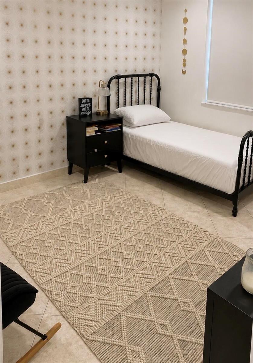A bedroom features a twin bed, a black nightstand, patterned wallpaper, and a textured area rug — 7971 Chula Vista Crescent, Boca Raton FL 33433, BOCA RATON, FL