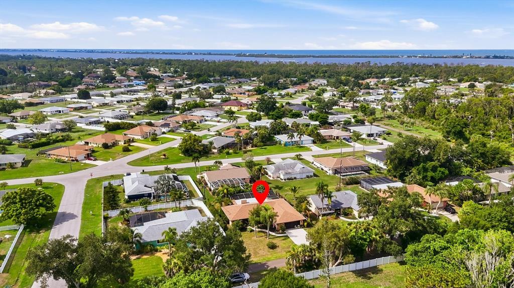 An aerial view shows a residential neighborhood with a red pin marking a single-family house — 925 N BOUNDARY ROAD, ENGLEWOOD, FL