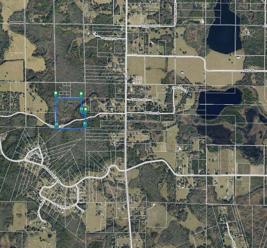 This is an aerial map showing a highlighted parcel of land near a road intersection — Tbd Duboise Drive, Clermont FL 34736, CLERMONT, FL