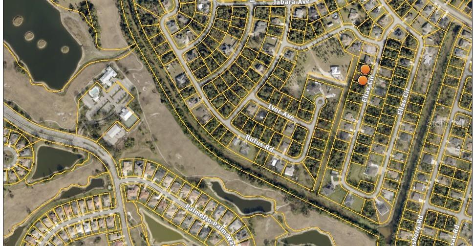This is an aerial map showing residential streets, houses, and surrounding bodies of water — ELIAS CIRCLE, NORTH PORT, FL