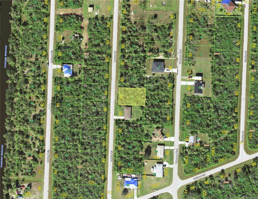This is an aerial map showing residential lots and streets in a wooded area — 354 LAWLER STREET, PORT CHARLOTTE, FL