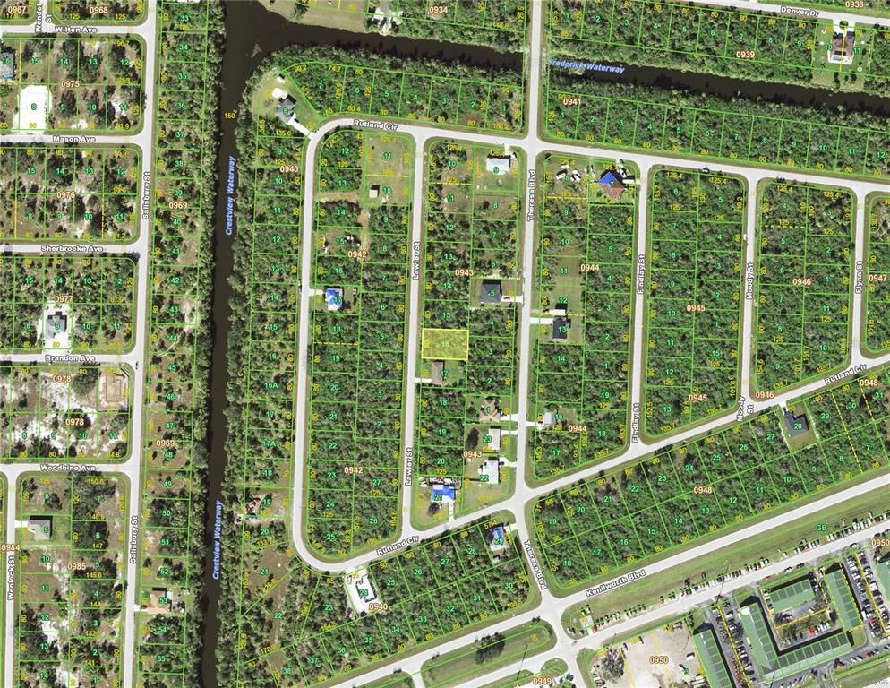 This is an aerial map showing residential lots and streets in a wooded neighborhood — 354 LAWLER STREET, PORT CHARLOTTE, FL