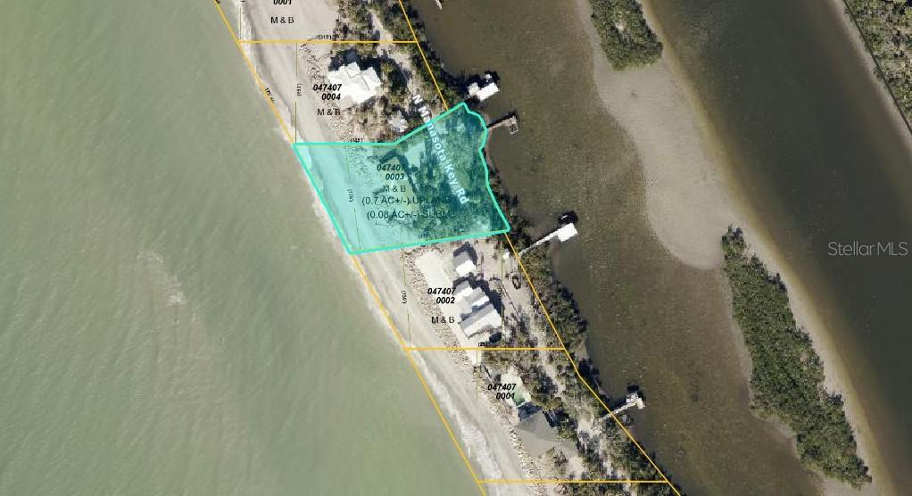 This is an aerial map showing a highlighted waterfront property parcel on a coastal road — 804 N MANASOTA KEY ROAD, ENGLEWOOD, FL