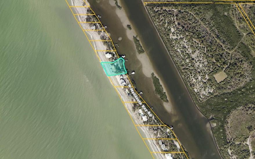 This aerial map shows a coastal property lot outlined in teal along a beach road — 804 N MANASOTA KEY ROAD, ENGLEWOOD, FL