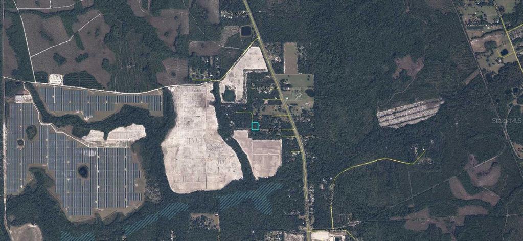 This is an aerial map showing a plot of land highlighted in blue — LANDRETH ROAD, GREEN COVE SPRINGS, FL