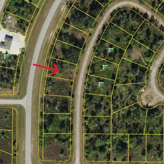 This is an aerial map showing several vacant residential lots outlined in yellow — LONGFELLOW LANE, NORTH PORT, FL