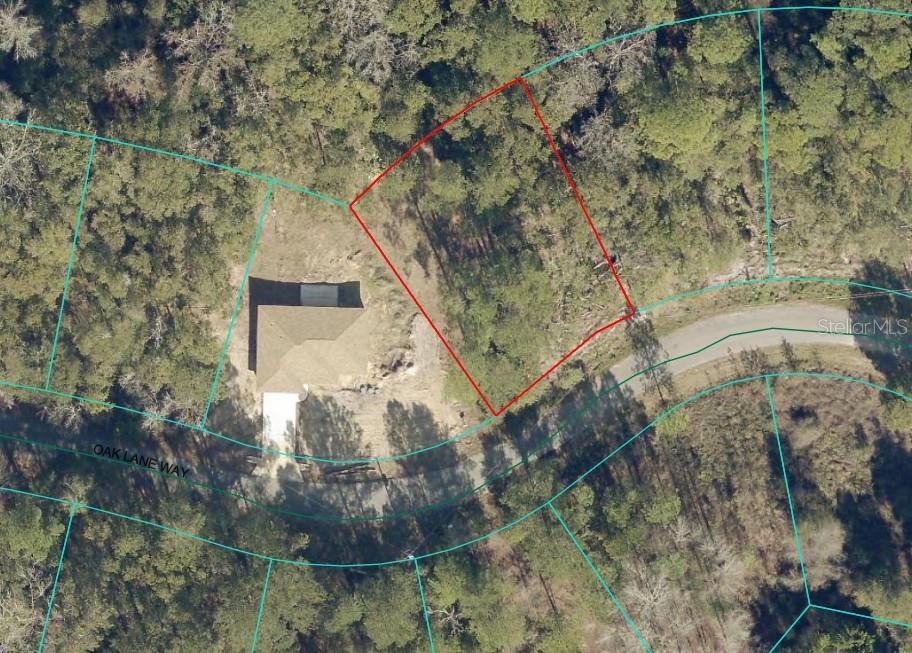 An aerial map view shows a vacant, wooded lot outlined in red next to a house — OAK LANE WAY, OCALA, FL
