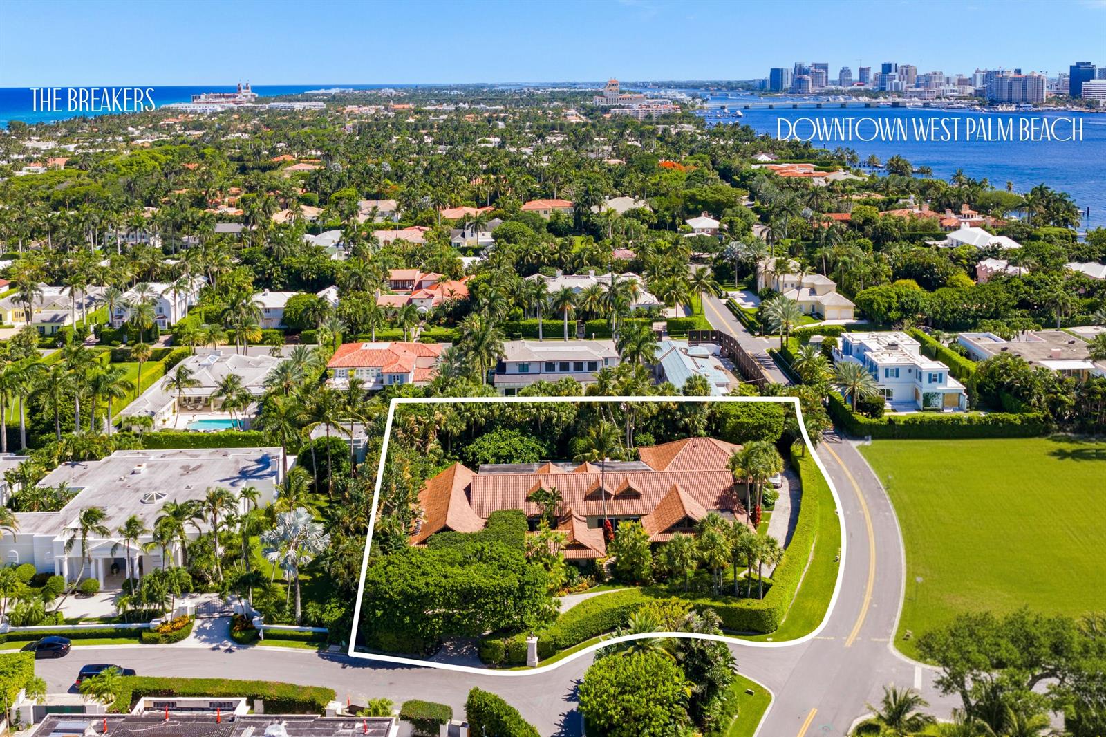 An aerial view shows a large house with a terracotta roof surrounded by lush landscaping — 6 La Costa Way, Palm Beach FL 33480, PALM BEACH, FL