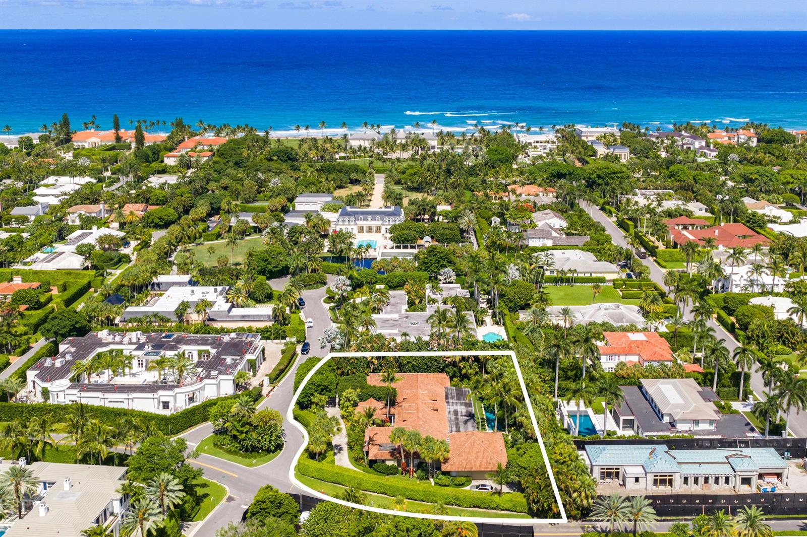 An aerial view shows a large residential property with a tiled roof and swimming pool — 6 La Costa Way, Palm Beach FL 33480, PALM BEACH, FL