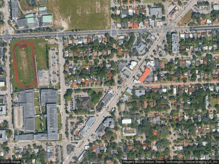 This is an aerial view of a suburban neighborhood featuring a school with a track — 13300 NE 9th Avenue, North Miami FL 33161, NORTH MIAMI, FL