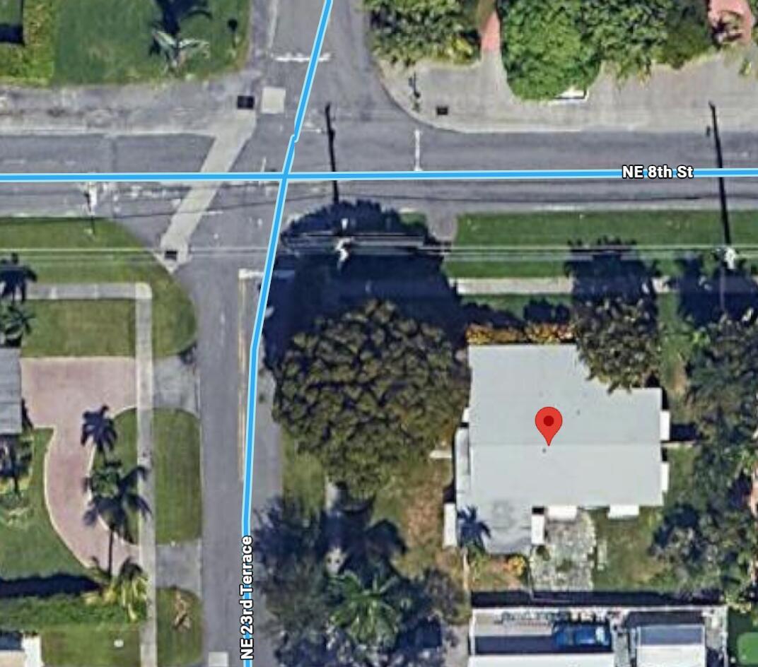 This is an aerial map view showing a residential property located at a street intersection — 712 NE 23rd Terrace, Pompano Beach FL 33062, POMPANO BEACH, FL