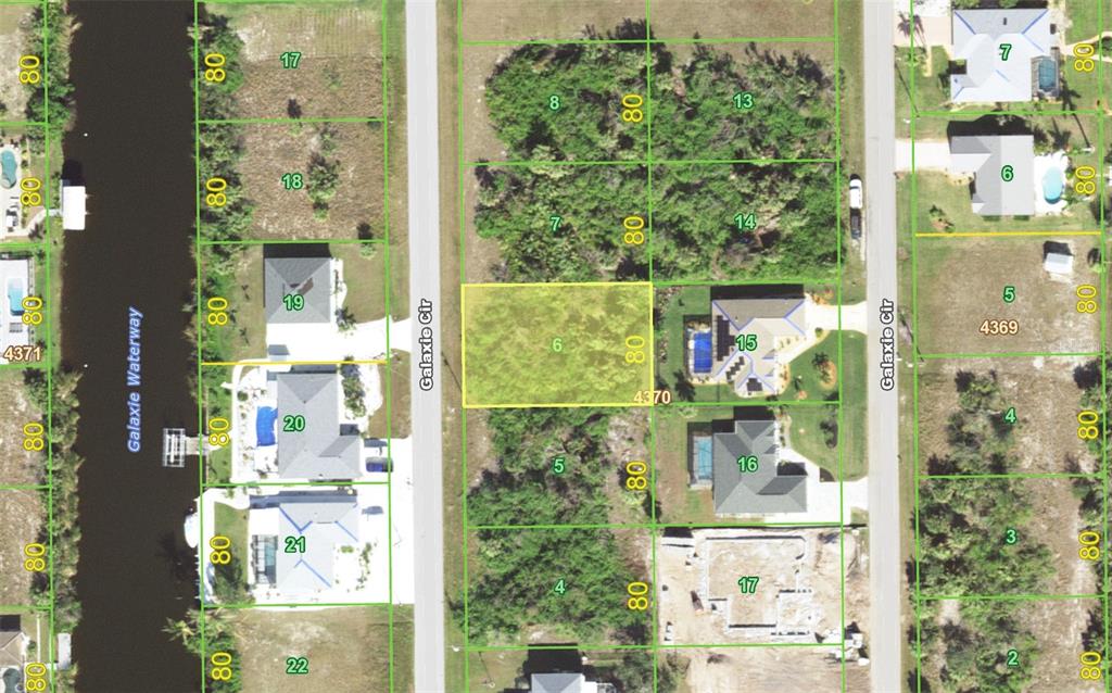 This is an aerial map showing residential lots and houses along Galaxie Cir and Galaxie Waterway — 9309 GALAXIE CIRCLE, PORT CHARLOTTE, FL