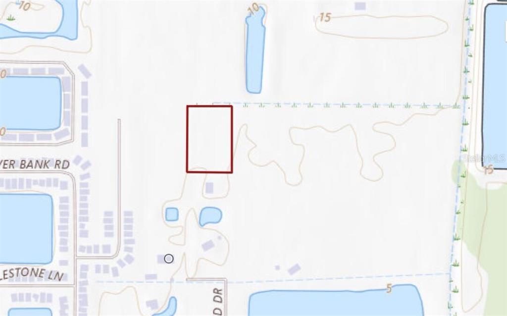 This is a map showing a rectangular property lot highlighted in red — 3100 ROWLAND DRIVE UNIT Tract B, PUNTA GORDA, FL