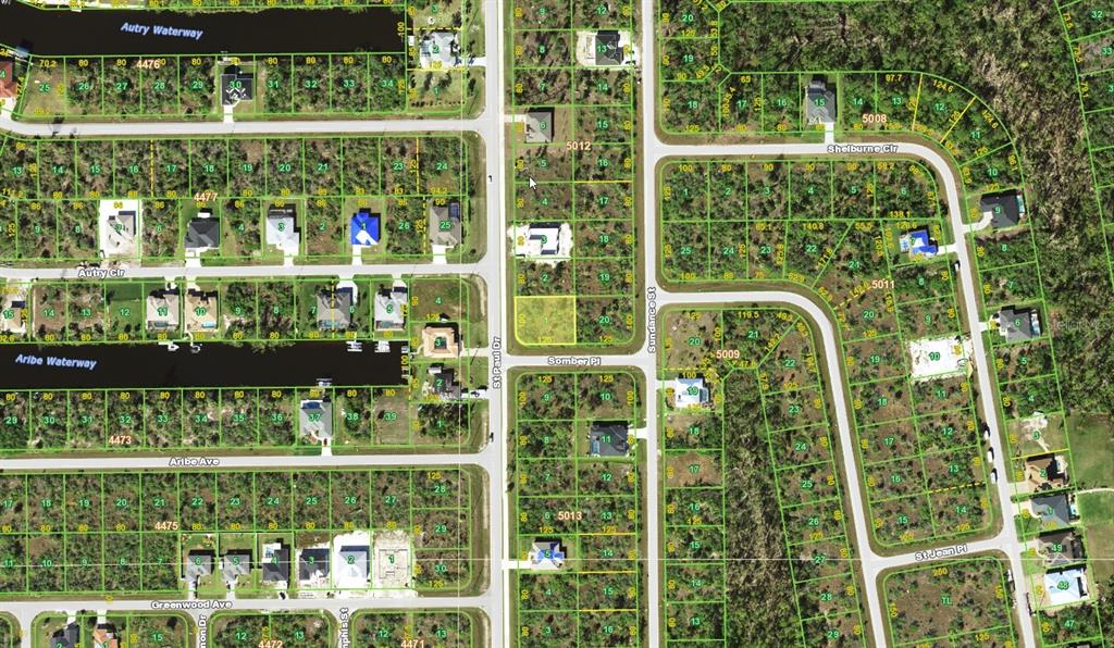 This is an aerial map showing residential lots and streets in a suburban neighborhood — 10072 ST PAUL DRIVE, PORT CHARLOTTE, FL