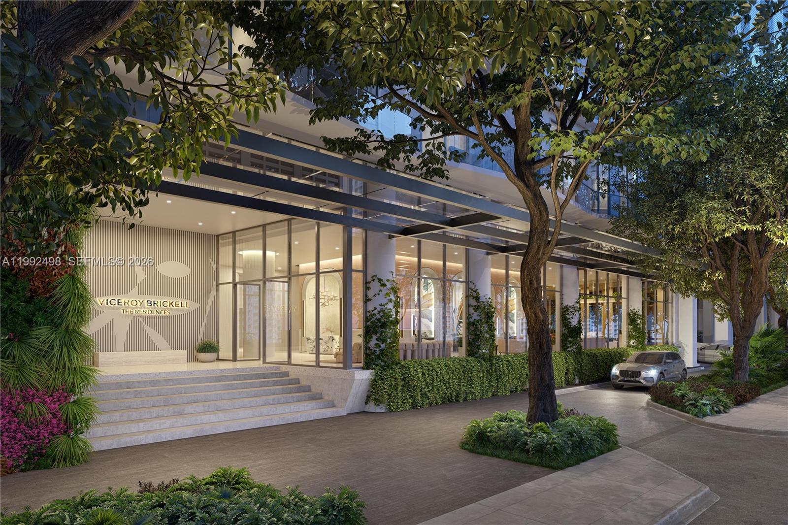 This architectural rendering shows the exterior entrance of a modern building with glass walls — 77 SE 5th St # 2204, Miami FL 33131, MIAMI, FL