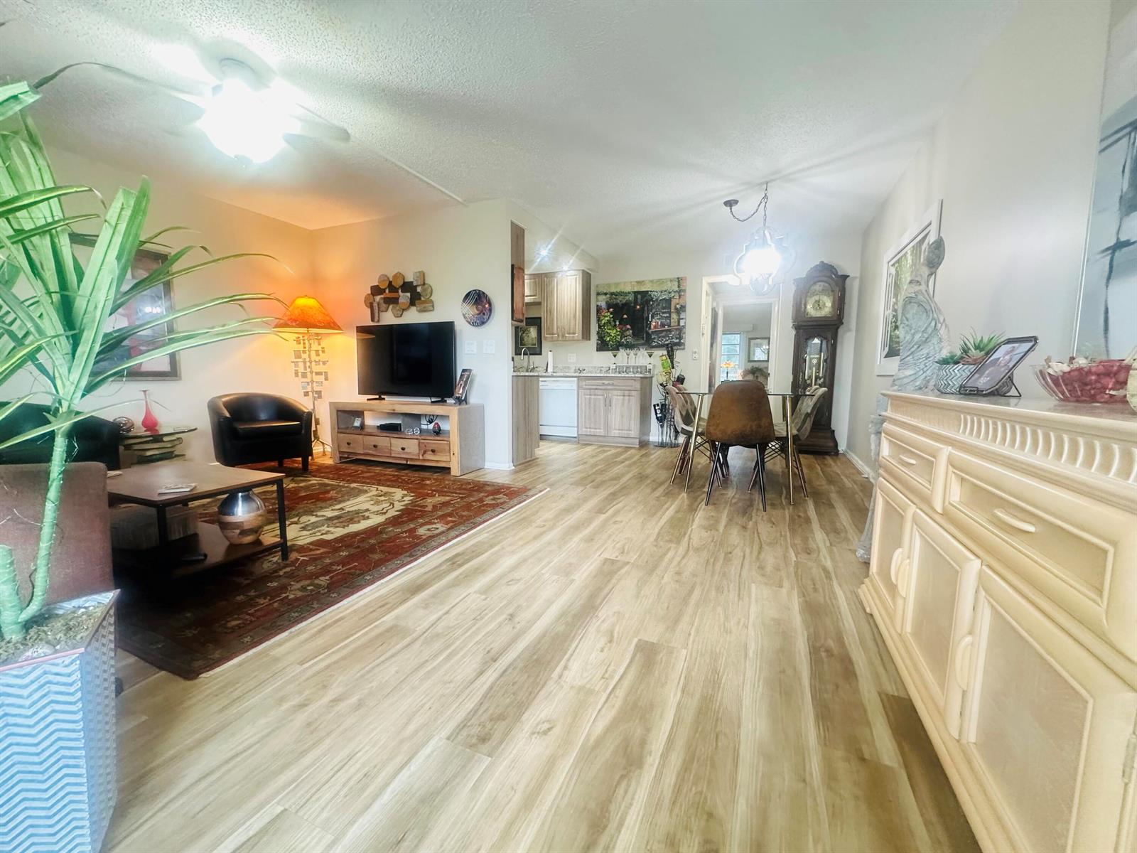 An exterior walkway with white railings leads past a door labeled 2157 and windows — 2157 Cambridge G # 2157, Deerfield Beach FL 33442, DEERFIELD BEACH, FL