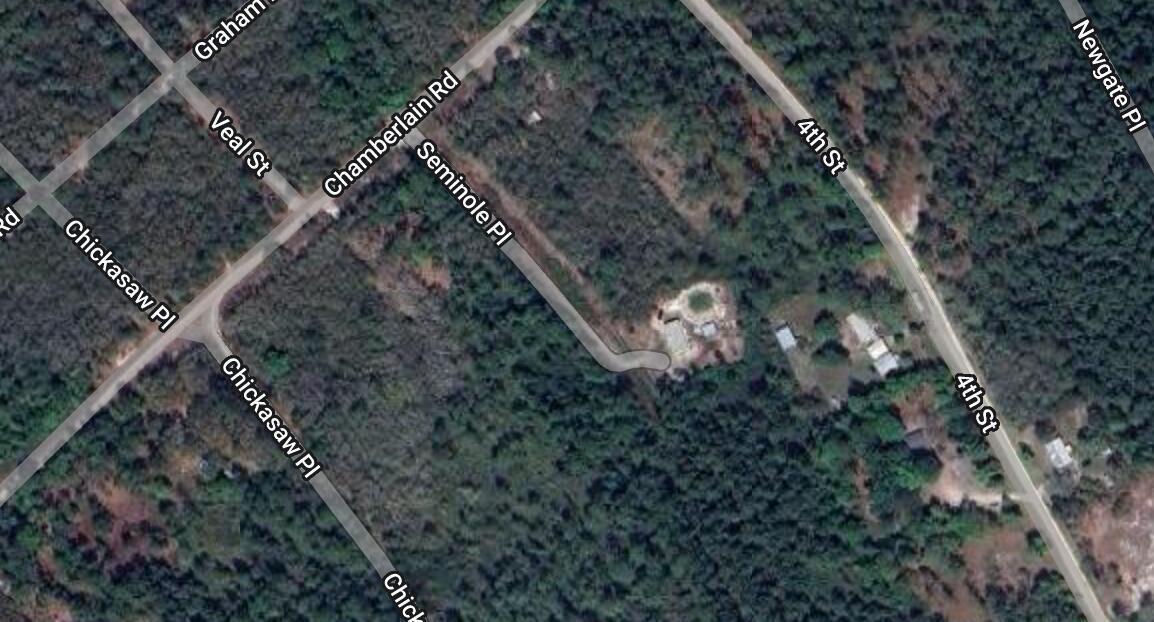 This is a satellite map view showing a residential lot at the end of a road — 123 Seminole Place, FL 32189, FL