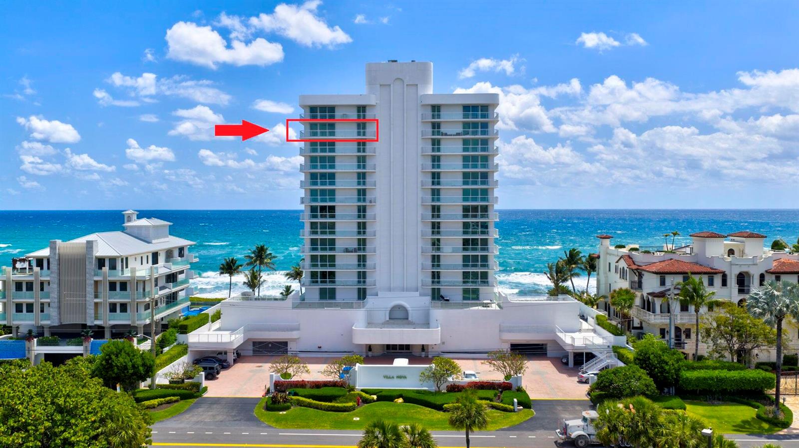 An exterior view of a white high-rise condominium building located directly on the oceanfront — 3505 S Ocean Boulevard # 14n, Highland Beach FL 33487, HIGHLAND BEACH, FL