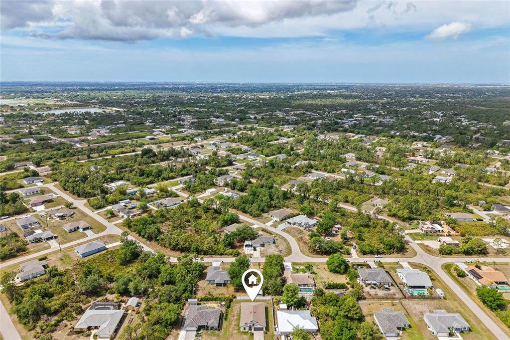 An aerial view shows a single-family home with a house icon marker in a neighborhood — 5413 DAYTON LANE, PORT CHARLOTTE, FL