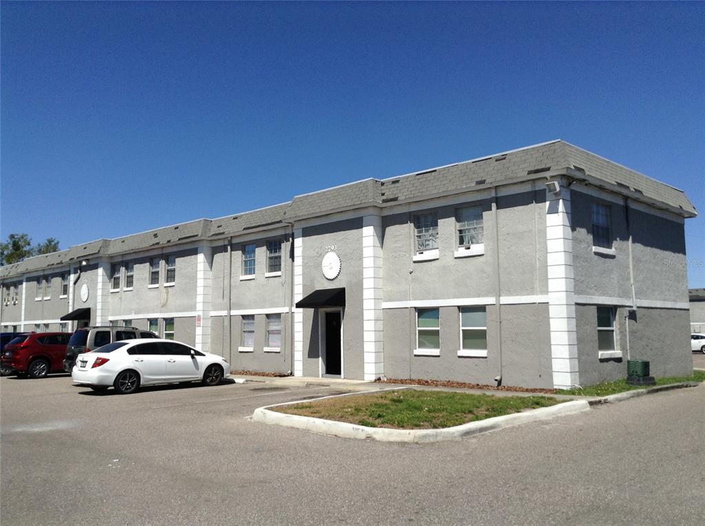 A two-story gray apartment building with white trim and a parking lot in front — 2791 L B MCLEOD ROAD UNIT 2791B, ORLANDO, FL